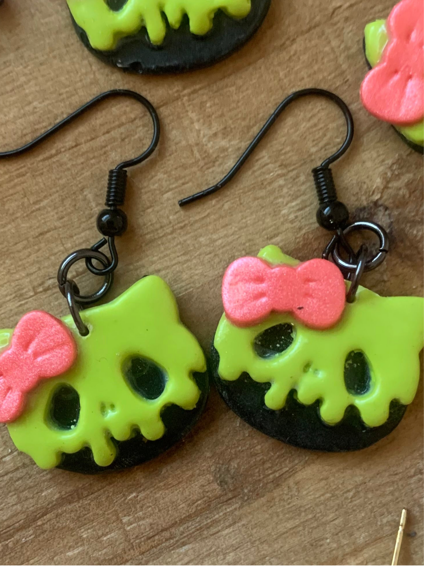 Poison cat earrings