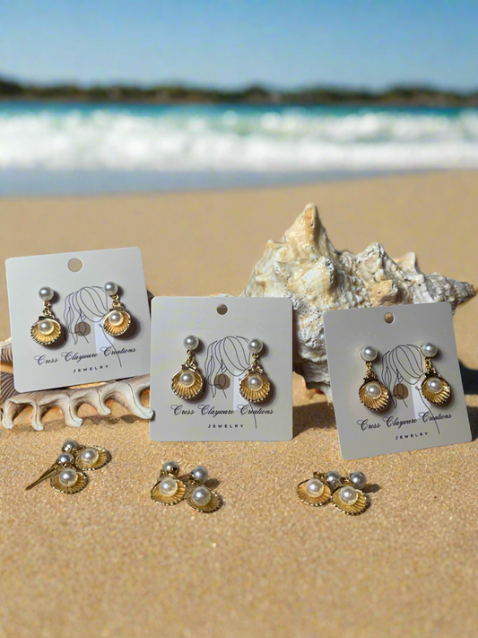 Pearl in seashell earrings