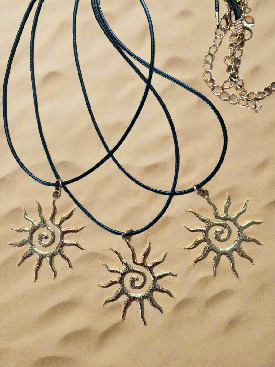 Sunburst gold & black necklace