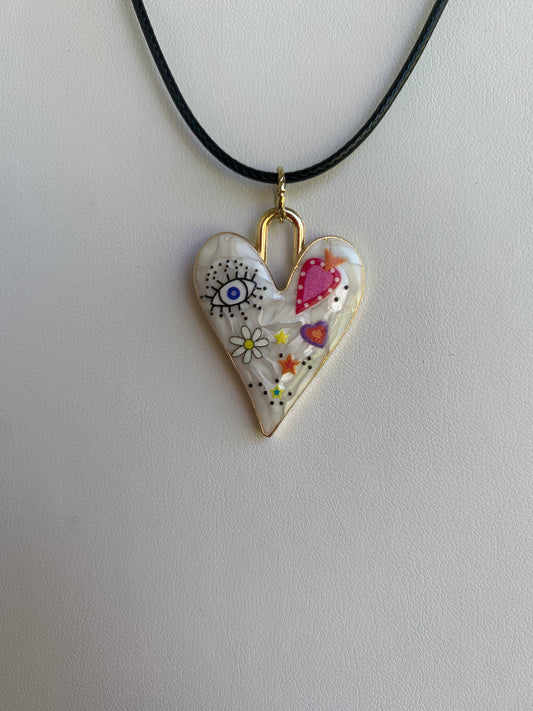 Heart necklace with evil eye