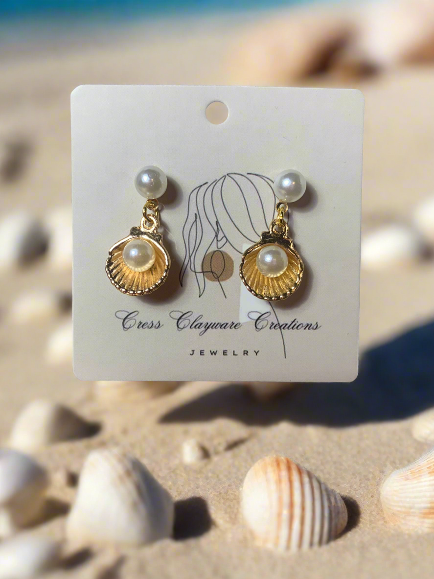 Pearl in seashell earrings