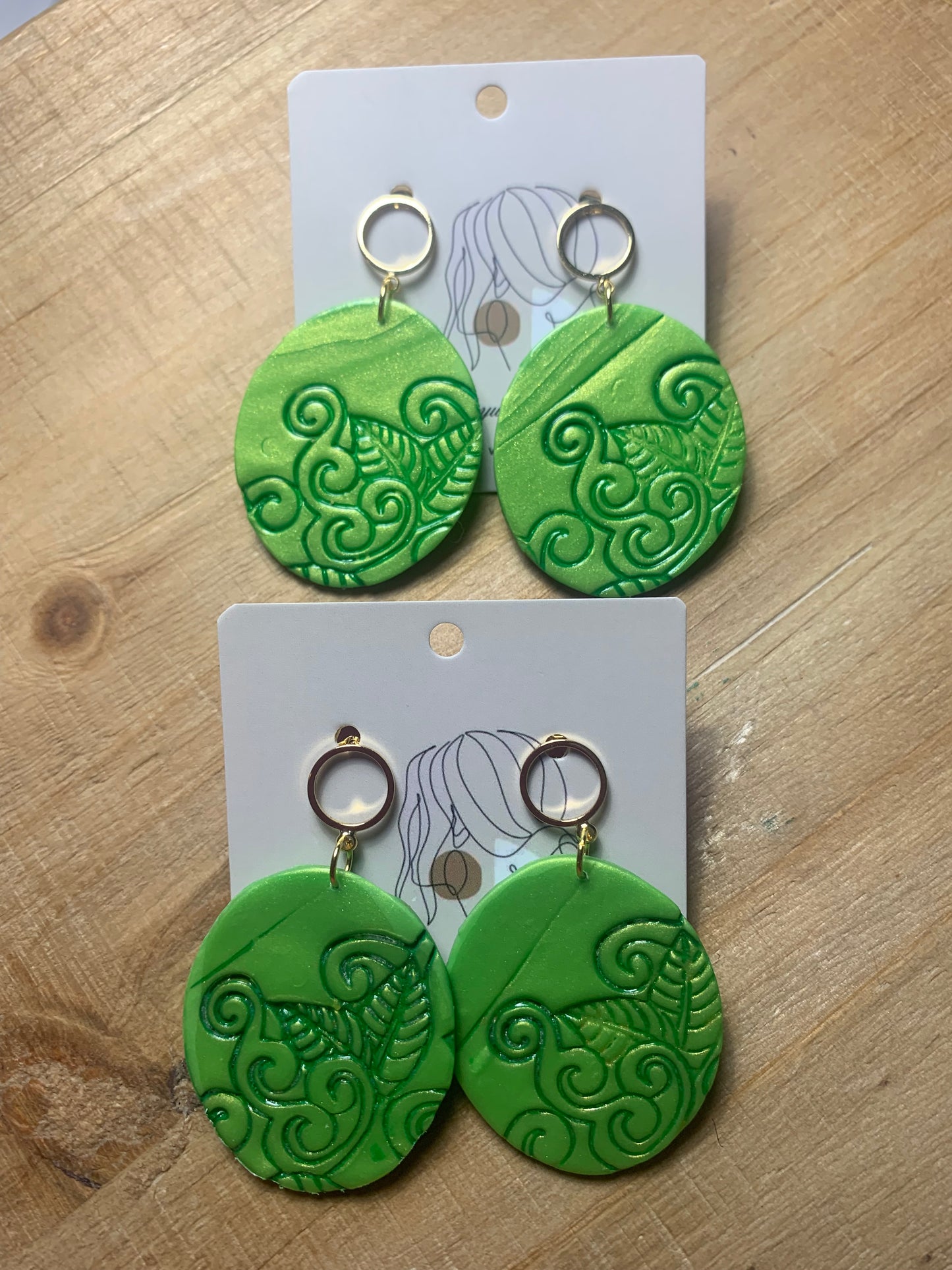 Hispanic flair pearl green earrings