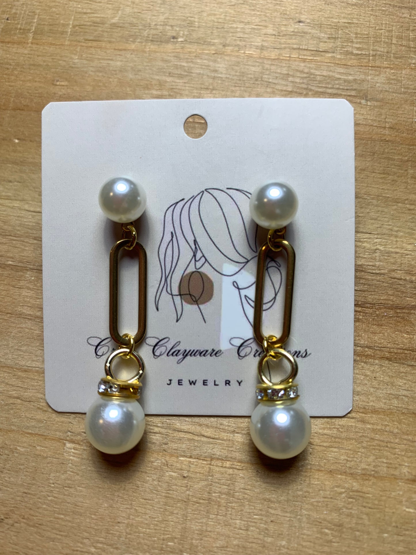 Pearl U drop earrings