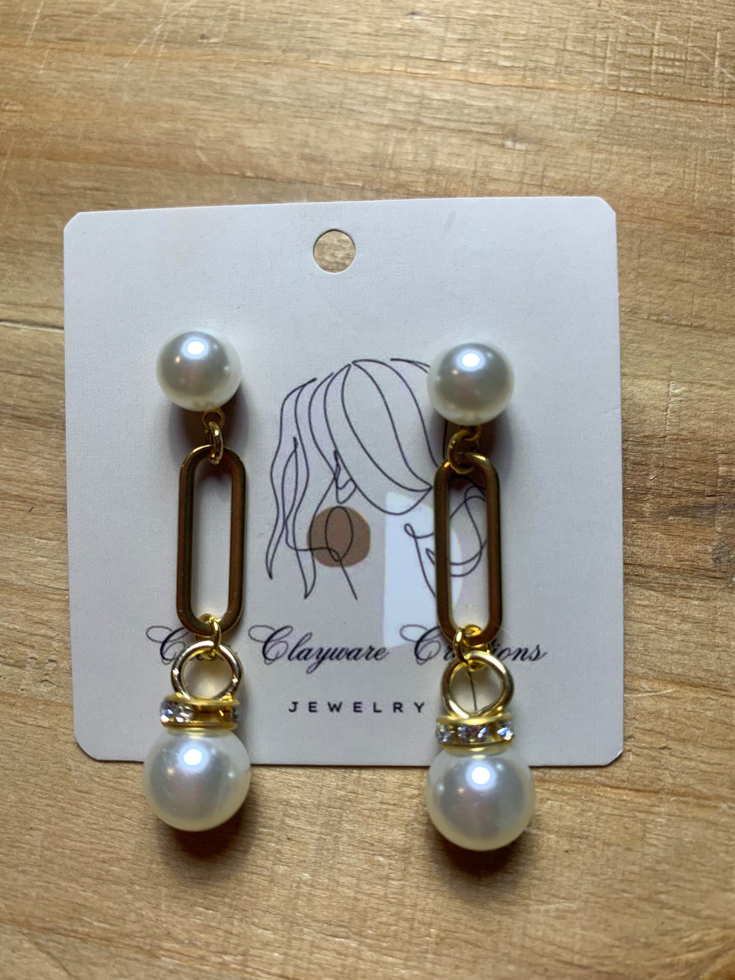 Pearl U drop earrings