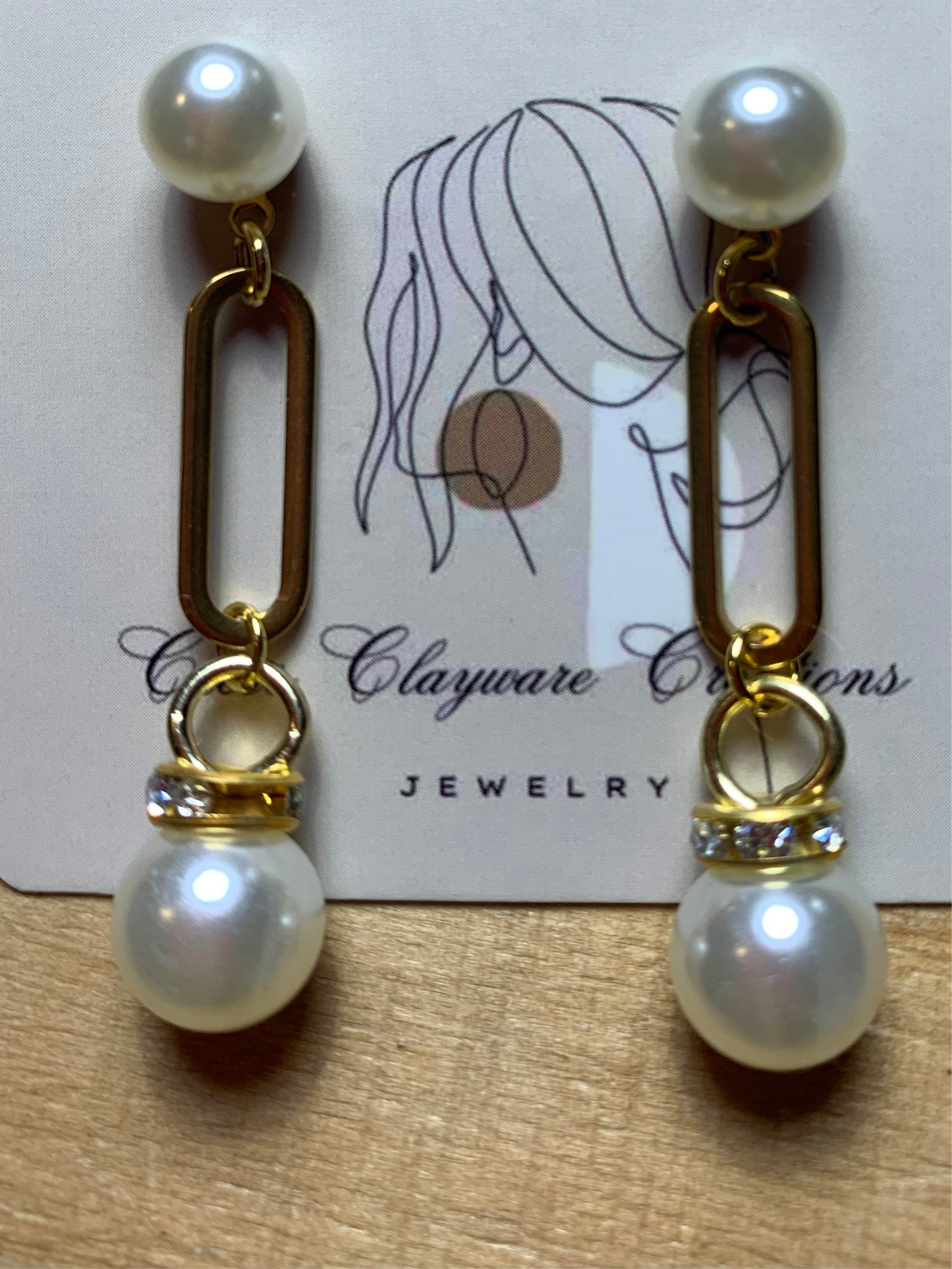 Pearl U drop earrings