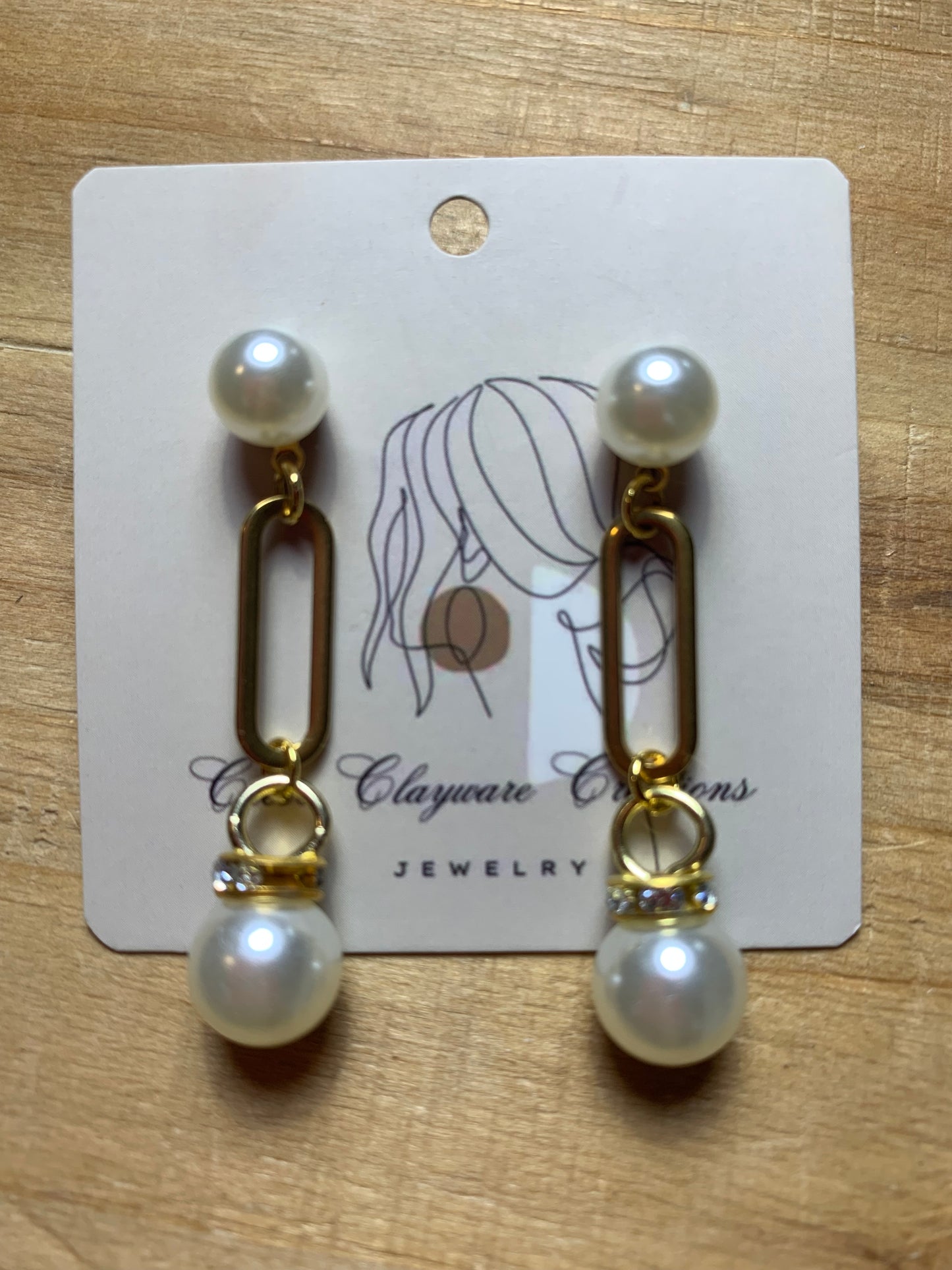 Pearl U drop earrings