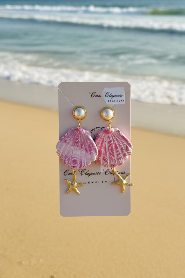 Pink seashell with starfish charms earrings
